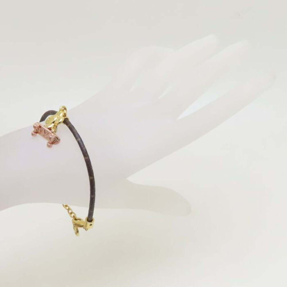 LOUIS VUITTON Brown Charm Bracelet - Picture 2 of 8